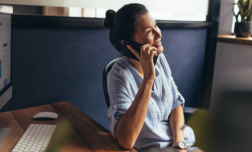 Female business professional making a phone call