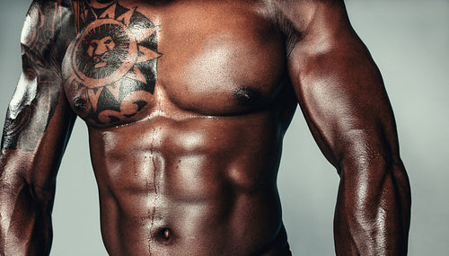 Shirtless male model with muscular physique