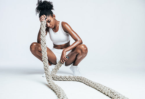 Woman relaxing during intense workout
