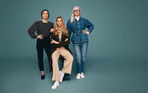 Three self-confident women looking at the camera