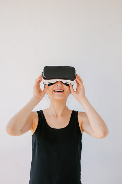 Young woman using the virtual reality device