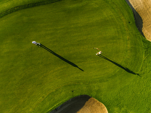 Aerial view of golfers playing on course