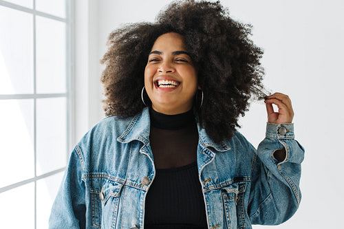 Beautiful woman smiling in demin jacket