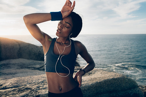Woman looking tired after intense physical training