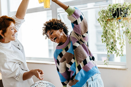 Colleagues celebrating in a modern co-working space