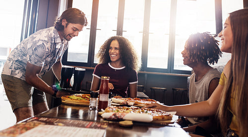 Group of friends at pizza restaurant