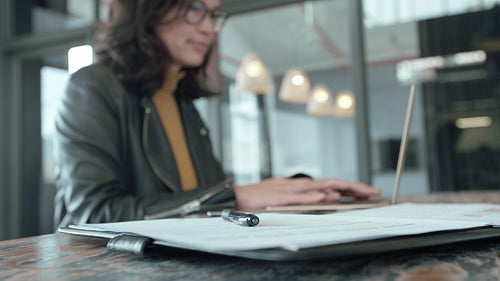 Business woman busy working on laptop at office