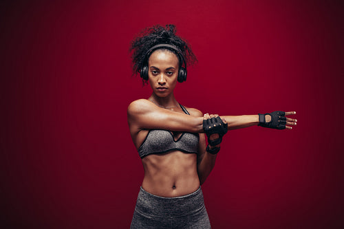 African woman doing warm up exercises