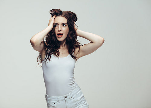 Sensual young brunette in studio