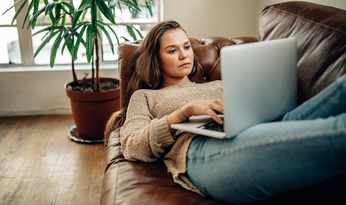 Woman working on laptop computer