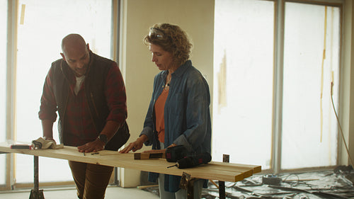 From vision to reality: Couple discussing home renovation plans