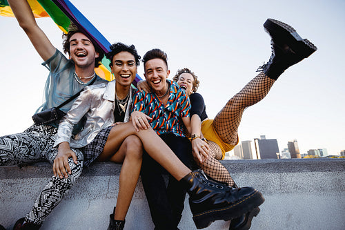 Queer people celebrating gay pride outdoors