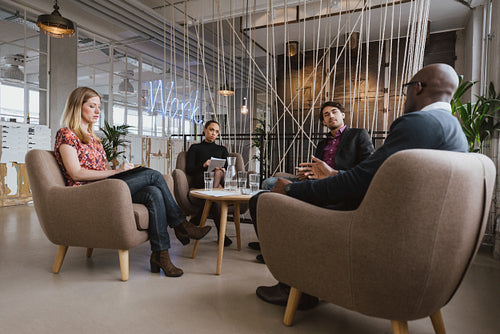 Creative business people discussing new project