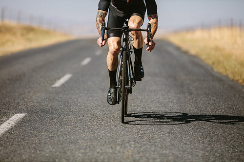 Professional cyclist practicing for a competition