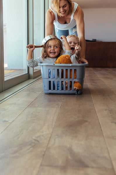 Beautiful family playing at home
