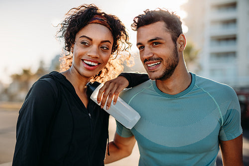 Fitness couple standing outdoors