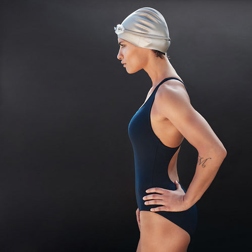 Confident young female swimmer