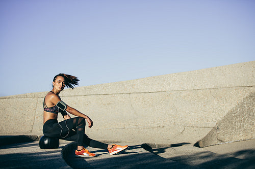 Fitness woman relaxing after workout
