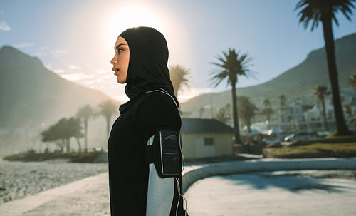 Muslim woman resting after a morning run