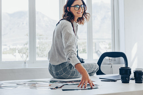 Female photographer at her workdesk