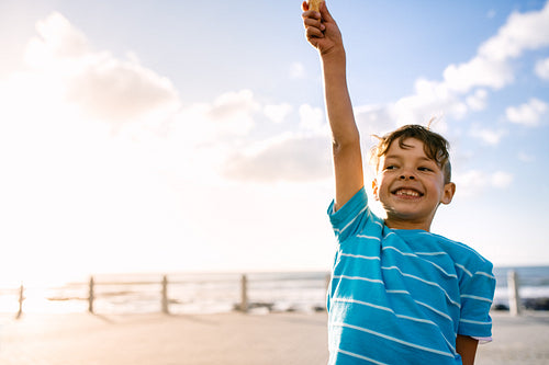 Boy enjoying his vacation at seafront