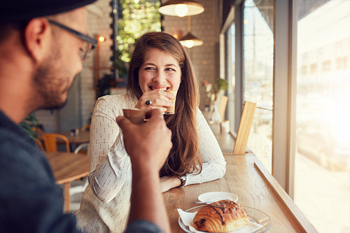 Young couple enjoying a coffee date