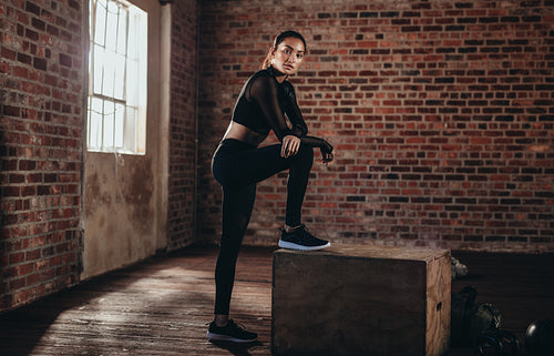 Fit woman standing in gym