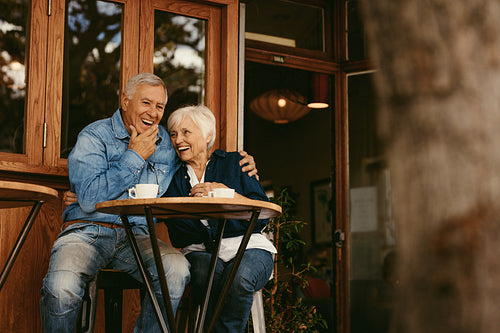 Retirement couple relaxing at cafe