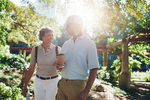 Mature tourist walking in a city park
