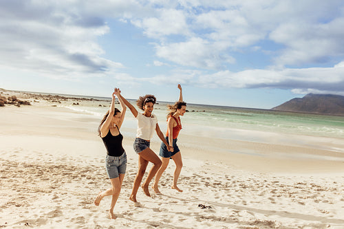 Friends having fun on the beach