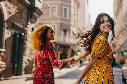 Traveler friends roaming in a new city