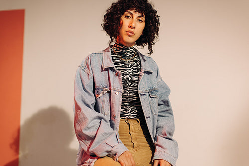 Confident young woman looking at the camera