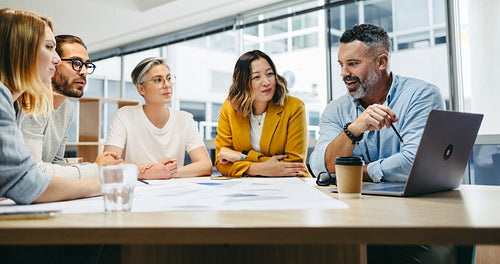 Group of multicultural designers having a meeting in an office