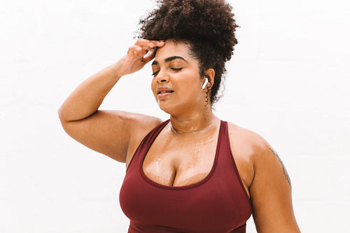 Exhausted plus size female after workout