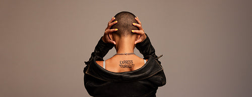 Anonymous woman covering her ears