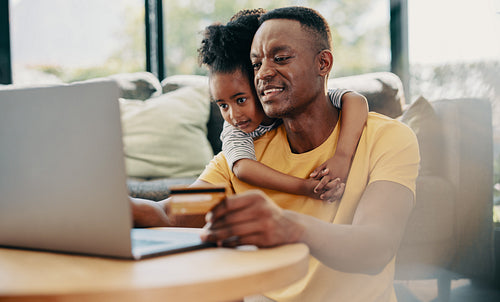 Online shopping and ecommerce, father and daughter buying things online