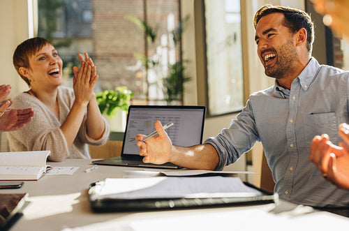 Man explaining creative ideas to colleagues