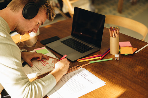 Artist making some illustrations at home