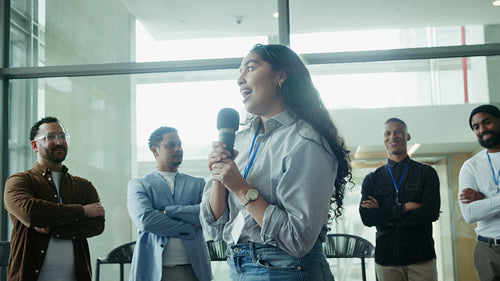 Woman speaker addresses interested audience