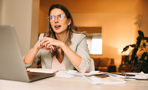 Female designer speaking during a virtual meeting