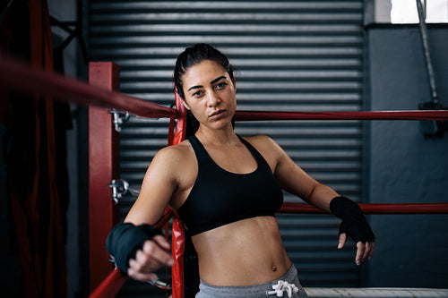 Female boxer inside a boxing ring