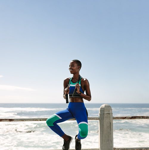 Woman taking a break after exercising outdoors.