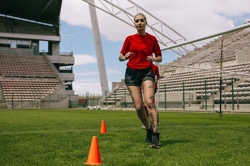 Female soccer players during training session on the field