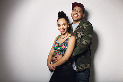 Beautiful young couple together smiling