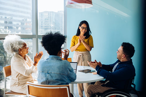 Celebrating clarity: The team applauds new progress