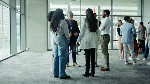 Business professionals networking and discussing