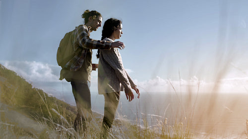 Affectionate couple embracing and looking away.