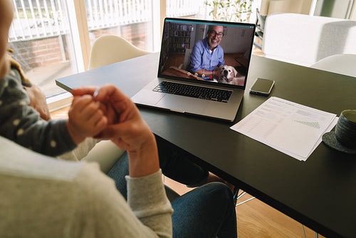 Woman having a video call with her father