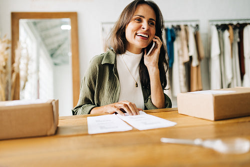Business woman discussing shipping details for her ecommerce business