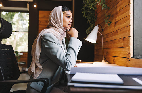 Ambitious Muslim designer thinking of creative ideas